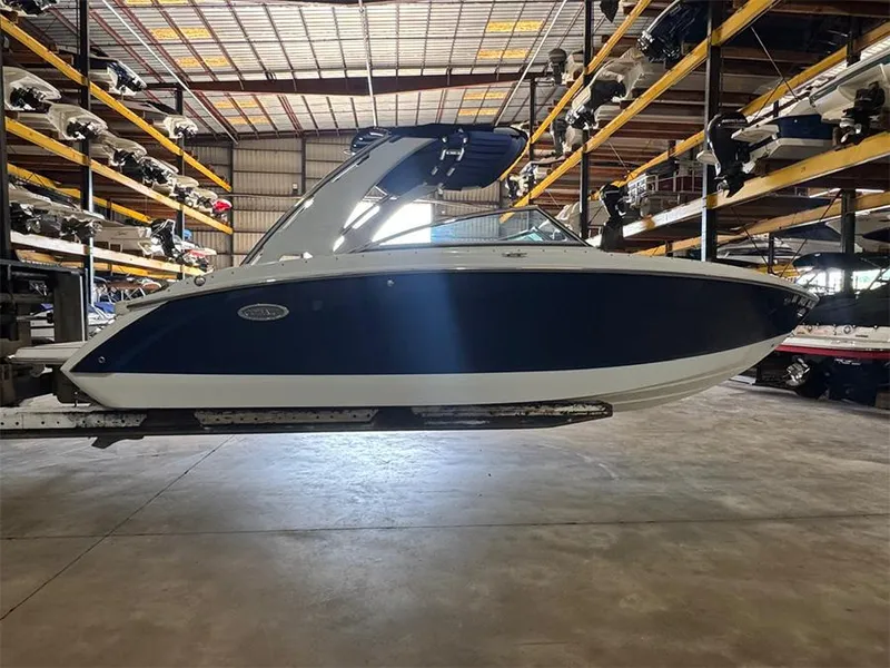 Slide: The Image of 2014 Cobalt R5 boat in storage facility, side view. - 3