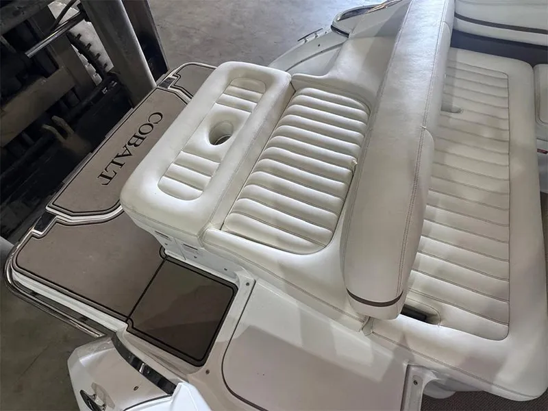Slide: The Image of 2014 Cobalt R5 boat with white leather seating and branded deck. - 7