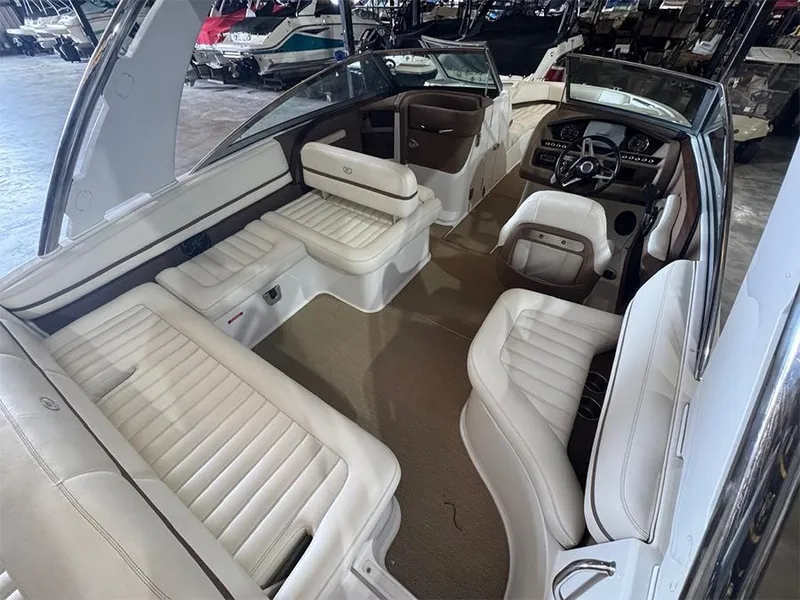 Slide: The Image of Luxurious interior of a 2014 Cobalt R5 boat with white leather seating. - 8