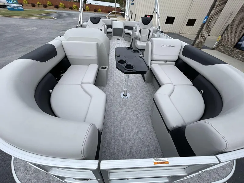 Slide: The Image of 2025 South Bay 222 RSLE pontoon boat with luxurious seating and modern design. - 31