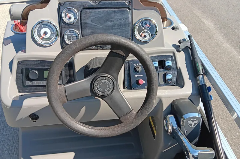 Slide: The Image of 2022 Avalon VLS Quad Lounge dashboard with steering wheel and control panel. - 10
