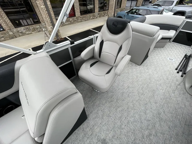 Slide: The Image of 2025 South Bay 222RSLE boat interior with luxurious seating and modern design. - 22