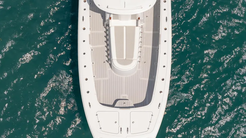 Slide: The Image of Aerial view of 2022 Freeman 43 boat on sparkling blue water. - 4