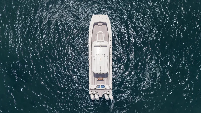 Slide: The Image of Aerial view of 2022 Freeman 43 boat on shimmering water. - 5