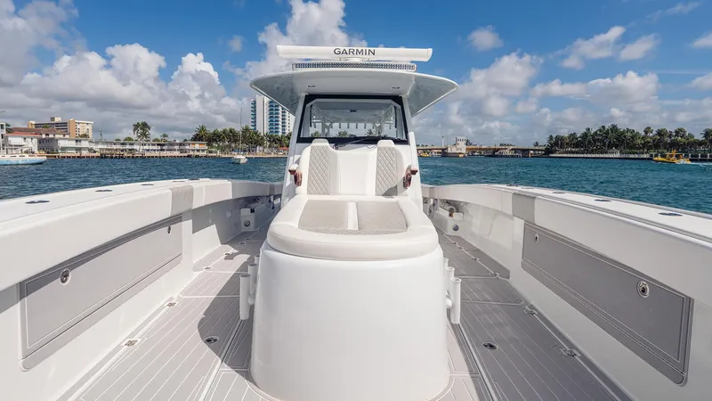 Slide: The Image of 2022 Freeman 43 boat on water, featuring spacious deck and modern design. - 7