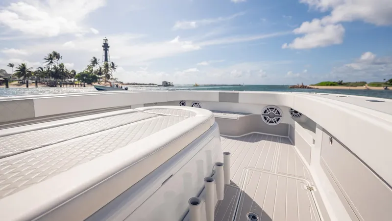 Slide: The Image of 2022 Freeman 43 boat deck with ocean view and distant lighthouse. - 9