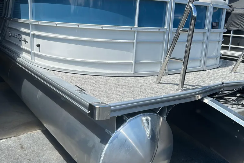 Slide: The Image of 2025 South Bay 222RSLE pontoon boat with sleek aluminum design and sturdy deck. - 8