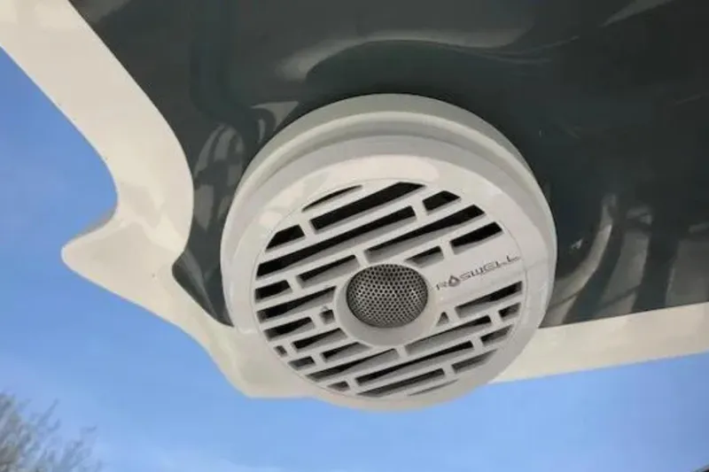 Slide: The Image of Outdoor speaker on a 2018 Cobalt R35 boat against a clear blue sky. - 21