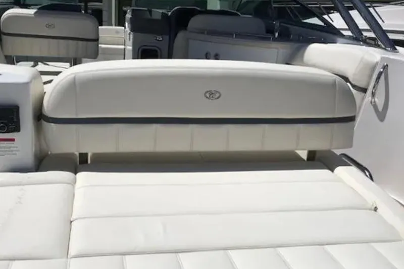 Slide: The Image of Luxurious white seating on a 2018 Cobalt R35 boat, showcasing comfort and style. - 4