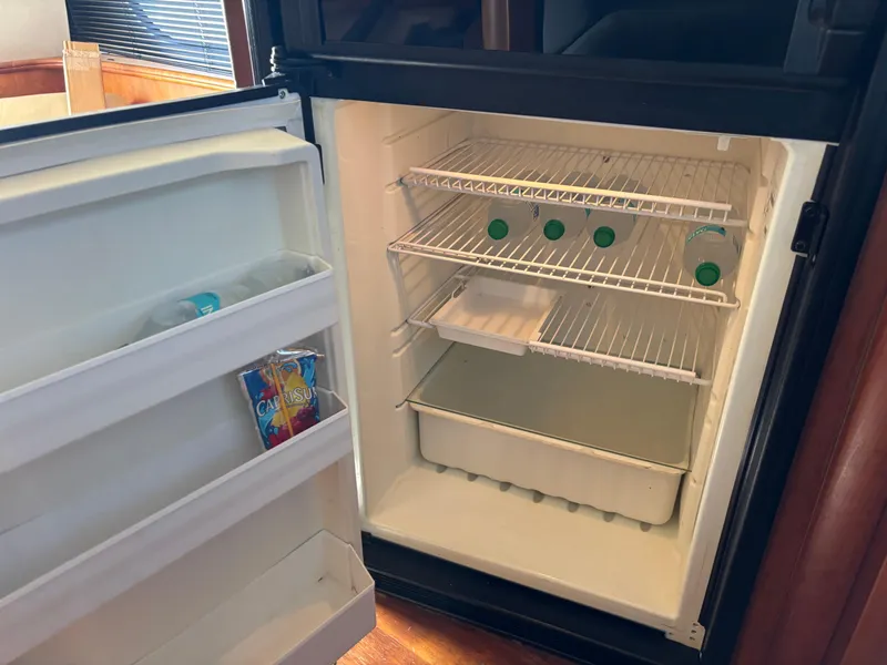 Slide: The Image of Control panel on 2001 Silverton 410 Sport Bridge, featuring Dometic display and buttons. - 14