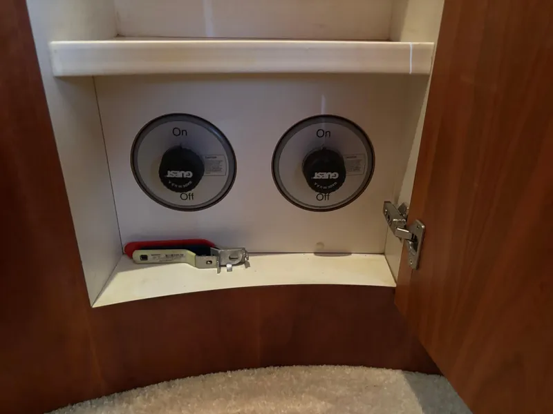 Slide: The Image of Interior view of 2001 Silverton 410 Sport Bridge with kitchen amenities and scenic window view. - 20