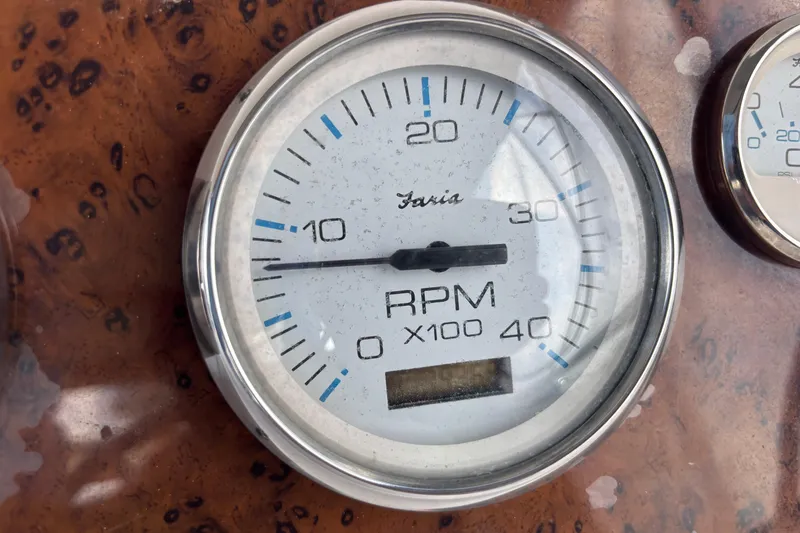 Slide: The Image of Tachometer gauge on 2001 Silverton 410 Sport Bridge, displaying RPM readings. - 48
