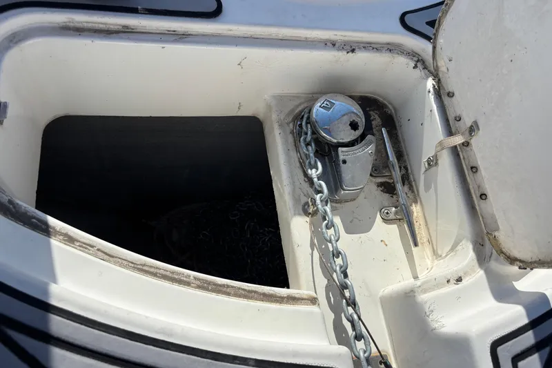 Slide: The Image of Anchor chain compartment on a 2001 Silverton 410 Sport Bridge boat. - 58