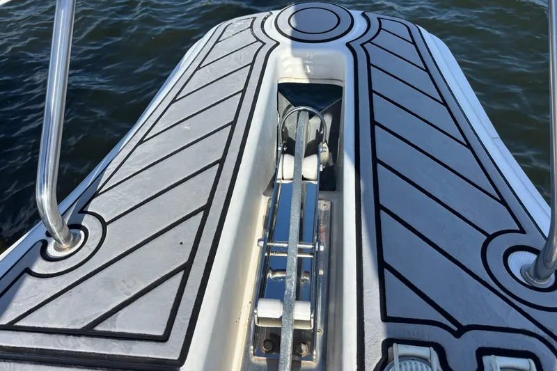 Slide: The Image of Bow of 2001 Silverton 410 Sport Bridge with sleek deck design. - 60