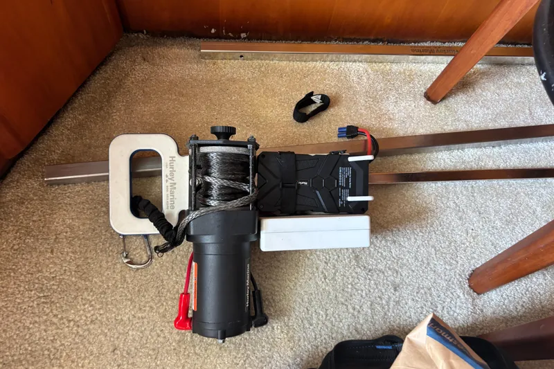 Slide: The Image of Electric winch on carpeted floor of 2001 Silverton 410 Sport Bridge boat. - 65