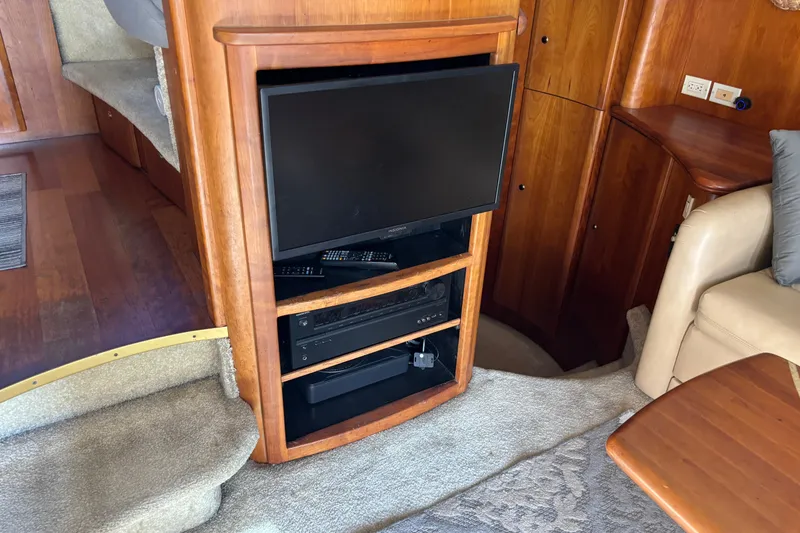 Slide: The Image of Interior of 2001 Silverton 410 Sport Bridge with TV and entertainment system. - 66