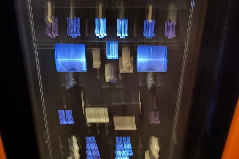 Slide: The Image of Control panel of a 2001 Silverton 410 Sport Bridge with illuminated switches and gauges. - 72