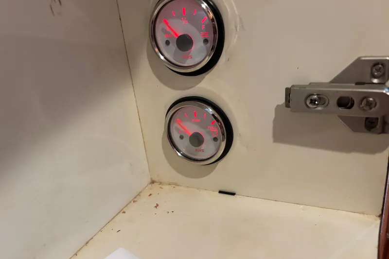 Slide: The Image of Close-up of gauges on a 2001 Silverton 410 Sport Bridge boat. - 75