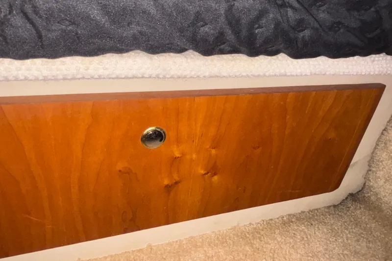 Slide: The Image of Wooden panel detail inside 2001 Silverton 410 Sport Bridge boat cabin. - 81