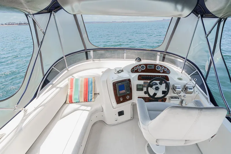 Slide: The Image of Helm of 2003 Meridian 341 Sedan yacht with panoramic ocean view. - 20
