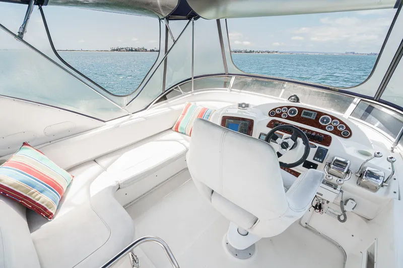 Slide: The Image of Interior of 2003 Meridian 341 Sedan yacht with helm and ocean view. - 28
