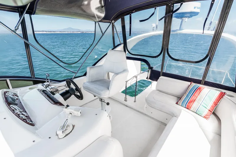 Slide: The Image of Interior of 2003 Meridian 341 Sedan yacht with helm and seating area. - 29