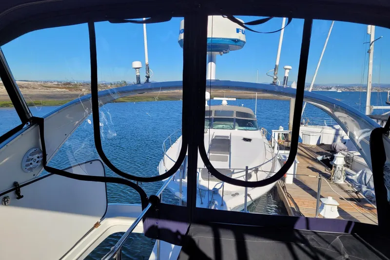 Slide: The Image of View from a 2003 Meridian 341 Sedan yacht docked at a marina. - 31