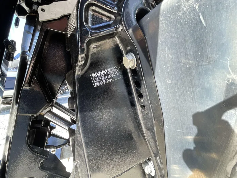 Slide: The Image of Close-up of a Suzuki motor component on a 2025 South Bay 224RSLE boat. - 11