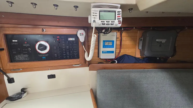 Slide: The Image of Electrical panel and navigation equipment inside a 1992 Catalina 30 Tall Rig sailboat. - 25