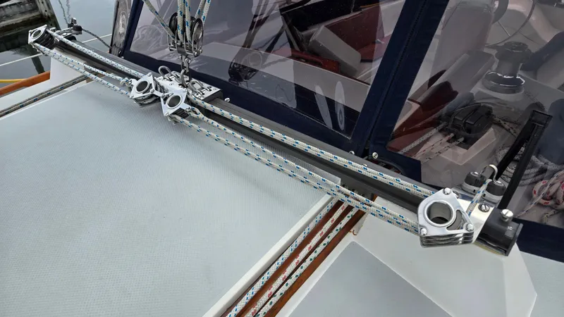 Slide: The Image of Catalina 30 Tall Rig 1992 sailboat deck with rigging and winch system. - 28