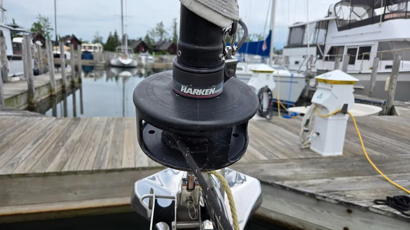 Slide: The Image of Bow of a 1992 Catalina 30 Tall Rig sailboat with Harken furling system at a marina. - 32