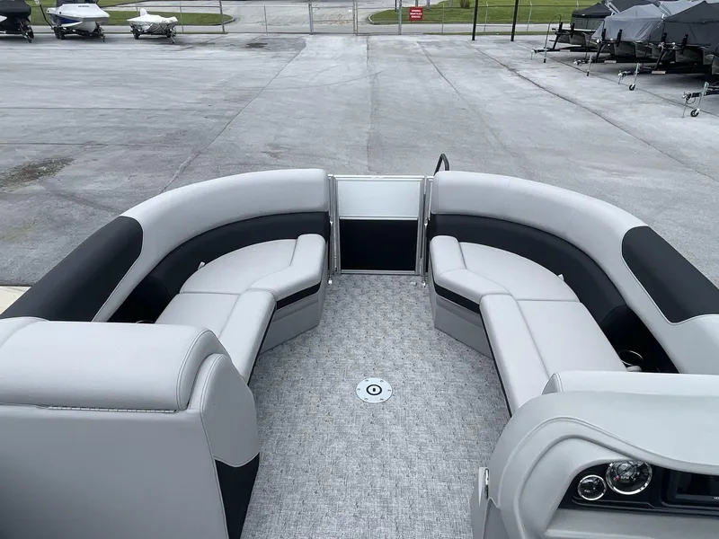 Slide: The Image of 2025 South Bay 224RSLE pontoon boat with spacious seating and modern design. - 22