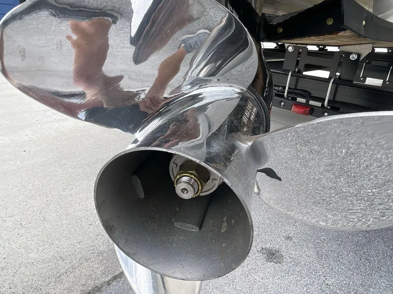 Slide: The Image of Close-up of a 2025 South Bay 224RSLE boat propeller on a trailer. - 6