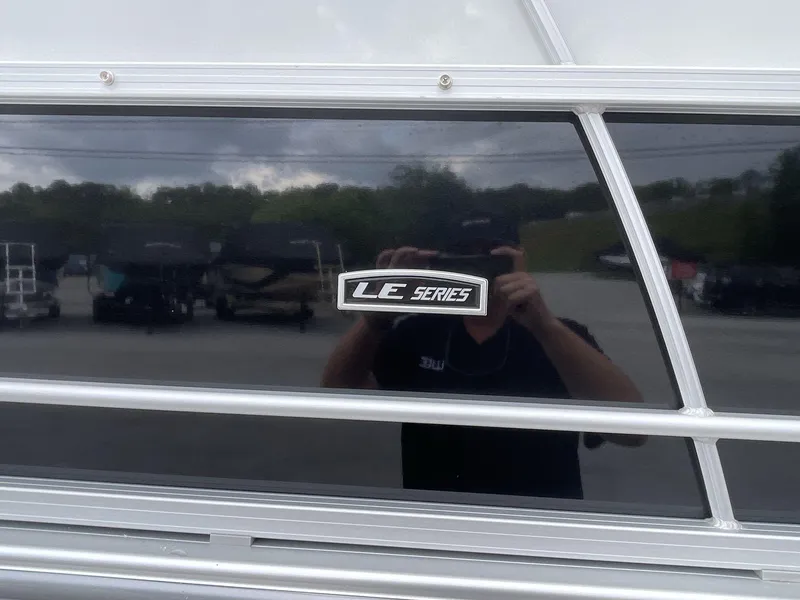 Slide: The Image of 2025 South Bay 224RSLE LE Series logo on boat exterior. - 9