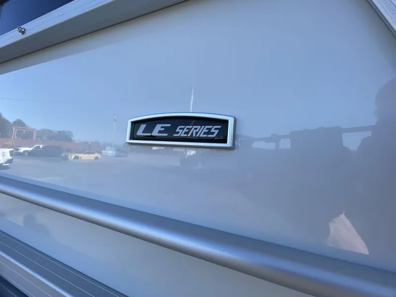 Slide: The Image of 2025 South Bay 224ULLE LE Series emblem on a sleek exterior surface. - 8