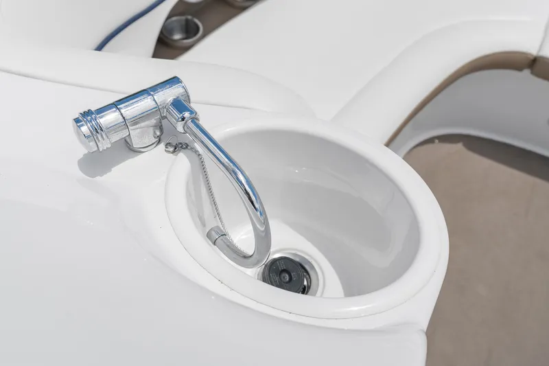 Slide: The Image of 2008 Four Winns F224 boat sink with chrome faucet detail. - 18