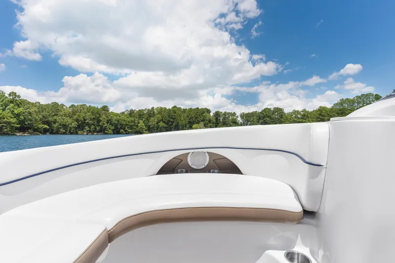 Slide: The Image of 2008 Four Winns F224 boat interior with white seating, lake view, and blue sky. - 19