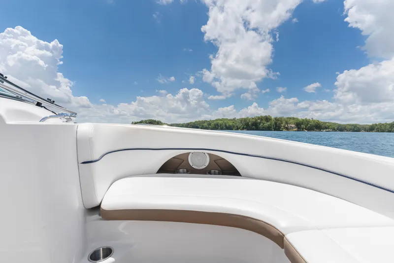 Slide: The Image of 2008 Four Winns F224 boat interior with lake view under a blue sky. - 20