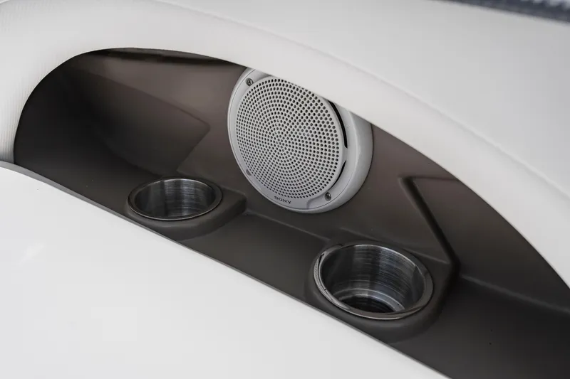 Slide: The Image of 2008 Four Winns F224 boat interior with speaker and cup holders. - 7