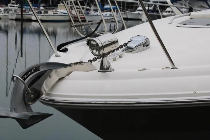 Slide: The Image of Bow of 2007 Sea Ray 340 Sundancer with anchor and railing in marina. - 10