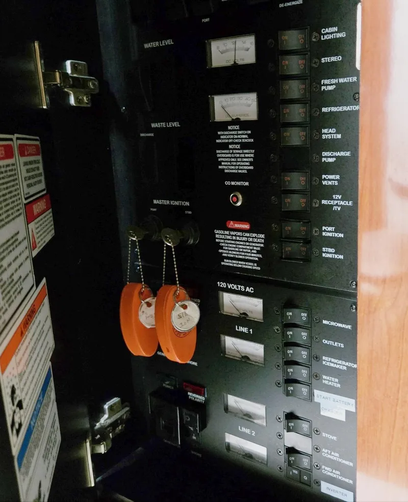 Slide: The Image of Electrical control panel on a 2007 Sea Ray 340 Sundancer boat. - 32