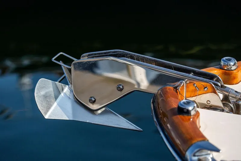 Slide: The Image of Close-up of a 2003 Hinckley Talaria 29R boat anchor and polished wood detail. - 43