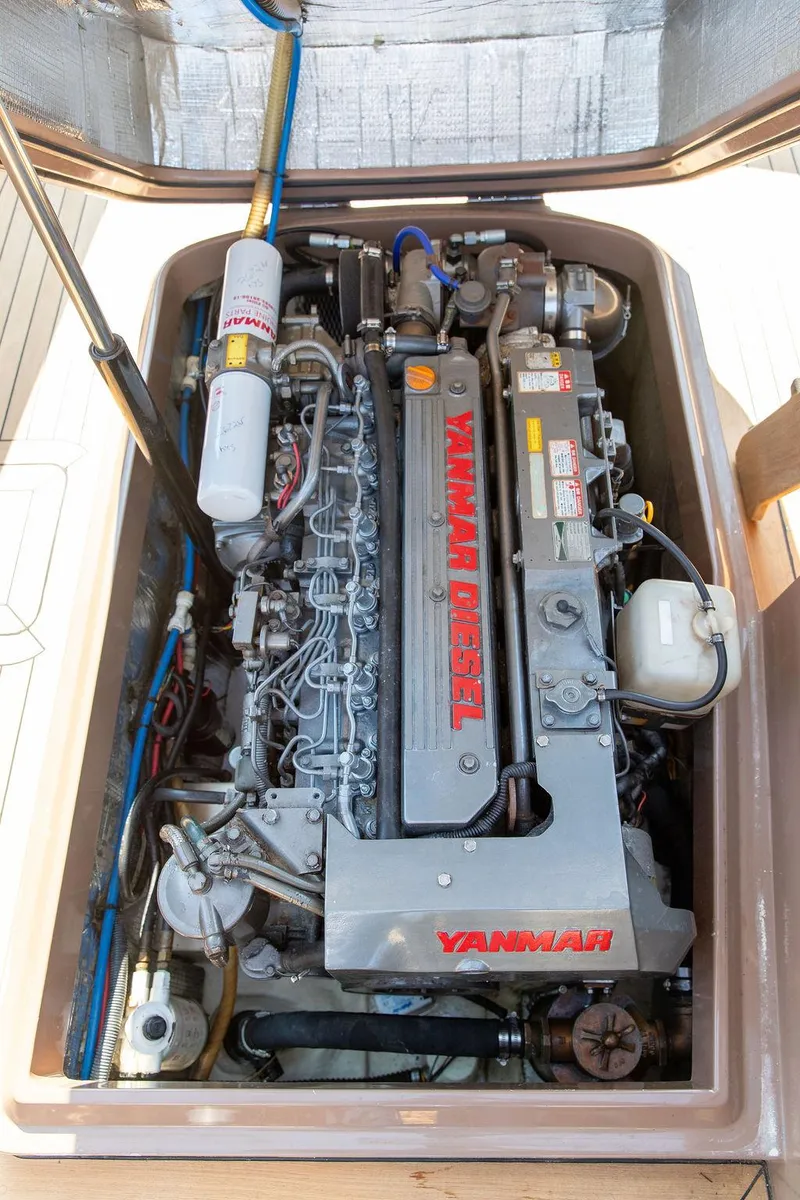 Slide: The Image of Yanmar diesel engine in a 2003 Hinckley Talaria 29R boat. - 45