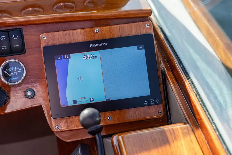 Slide: The Image of Raymarine navigation display on 2003 Hinckley Talaria 29R boat dashboard. - 33
