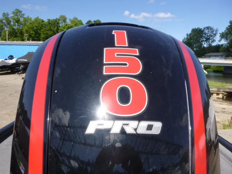 Slide: The Image of Close-up of 2023 Tracker Pro Team 195 TXW Tournament Edition engine with '150 Pro' decal. - 14