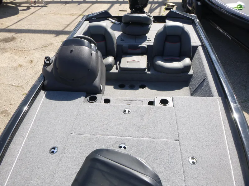 Slide: The Image of 2023 Tracker Pro Team 195 TXW Tournament Edition boat interior with seating and console. - 5