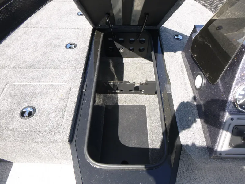 Slide: The Image of 2024 Ranger VS1682SC Angler boat storage compartment with open lid, showcasing interior space. - 10