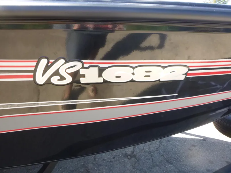 Slide: The Image of 2024 Ranger VS1682SC Angler boat with bold model lettering and sleek design. - 14