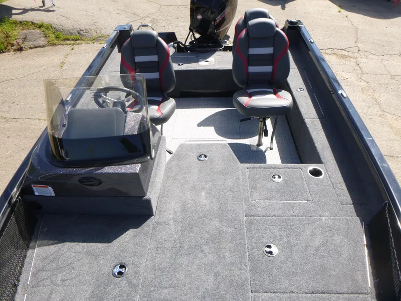 Slide: The Image of 2024 Ranger VS1682SC Angler boat interior with dual seats and steering console. - 5