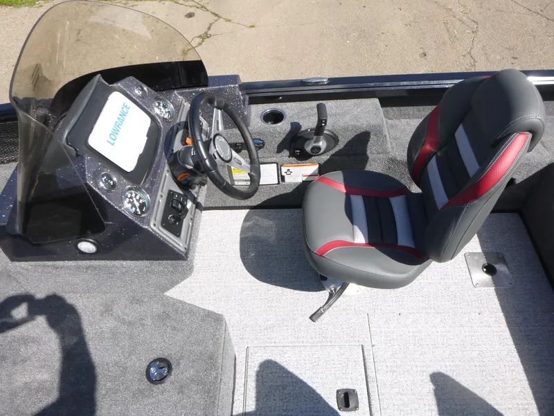 Slide: The Image of 2024 Ranger VS1682SC Angler boat cockpit with steering wheel and seat. - 6